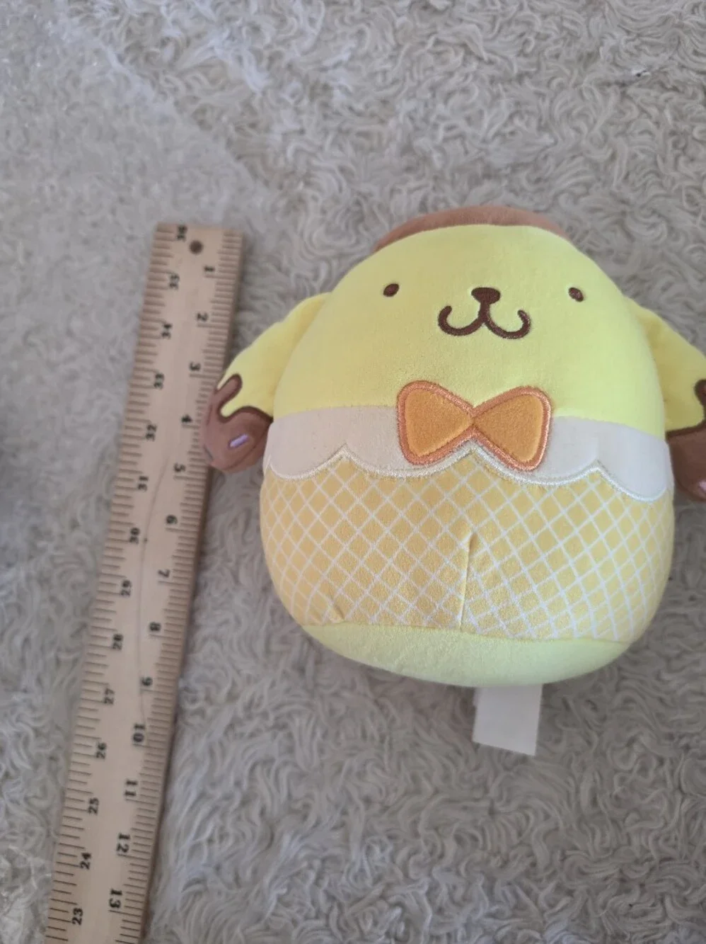 Squishmallows Yellow Puppy Plush with Orange Bow and Brown Ears